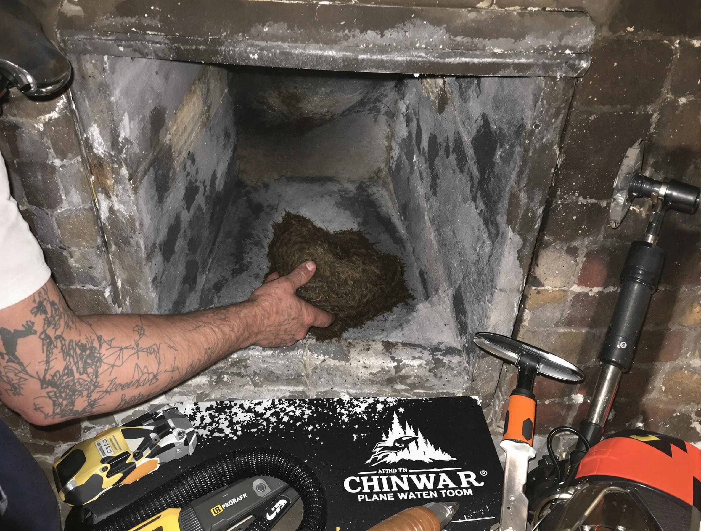 Locust Grove Chimney Sweep safely removing debris and screening chimney in Locust Grove, GA